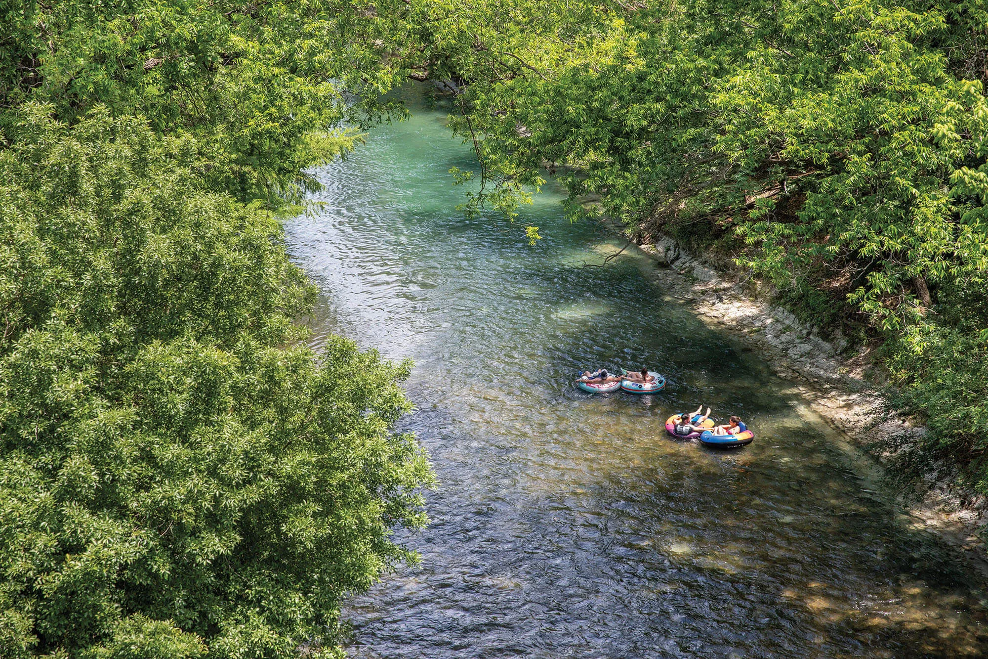 the comal river in new braunfels, tx